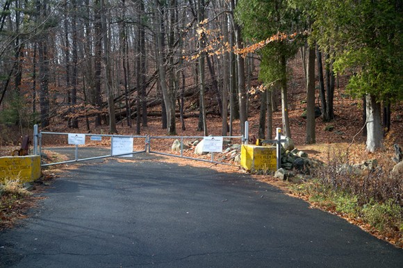 Paved park road with gate.