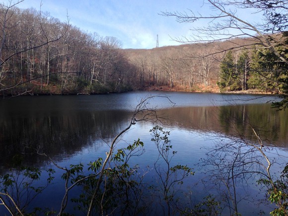 Reservoir with a communication tower in the distance.