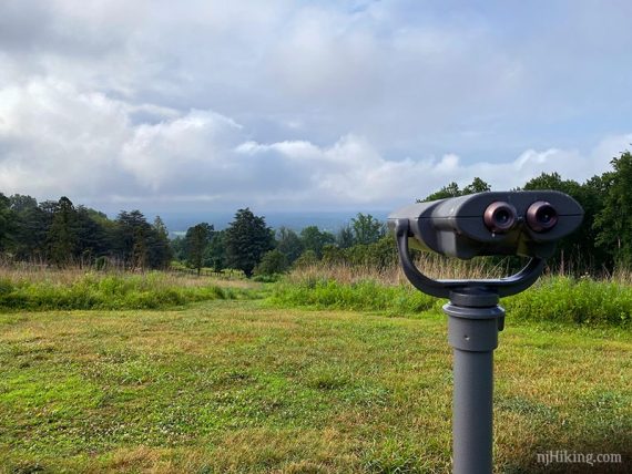 Viewing scope at top of hill.