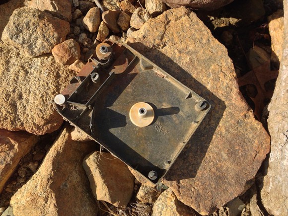8-Track tape case laying on rocks.