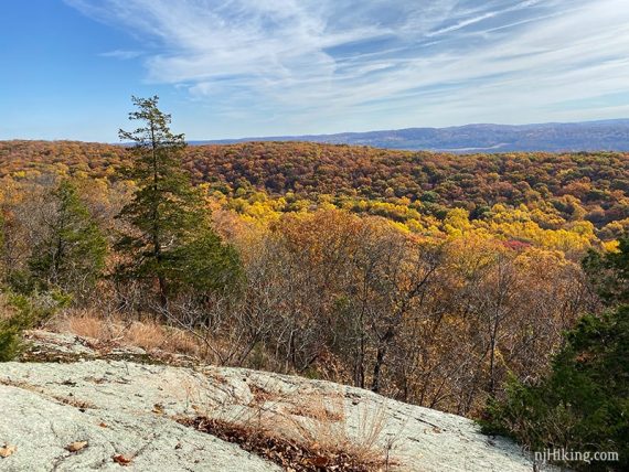 Rocky ledge overlooking multi-colored foliage at Jenny Jump.