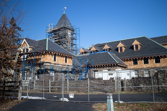 Coach House and clock tower fenced off for renovations.