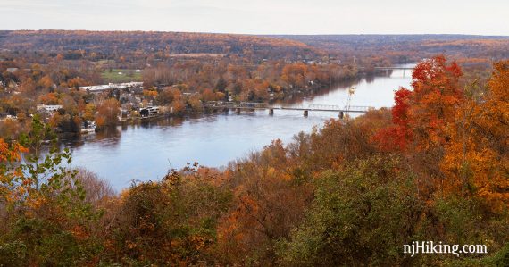 Delaware River, New Hope, and Lambertville covered in fall foliage seen from Goat Hill.