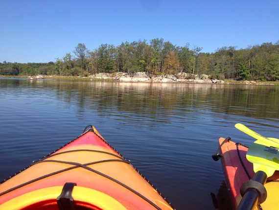 View of the rocky shoreline of Splitrock Reservoir from kayaks.