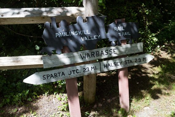 Paulinskill Valley Trail wooden train sign.