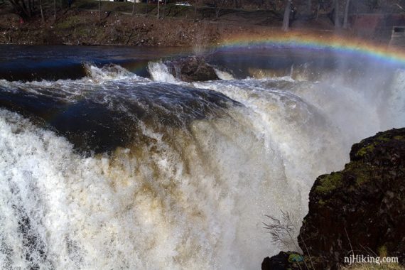 Rainbow above a waterfall.