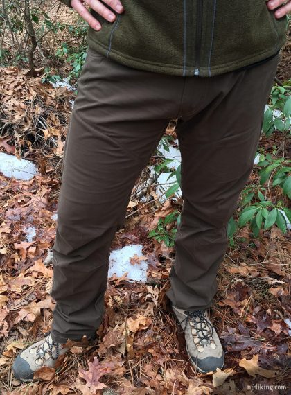 Hiker showing the front of the Konfidant Air pant.