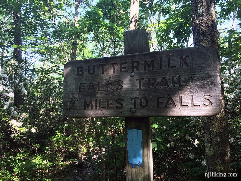 Buttermilk Falls sign at the junction with the Appalachian Trail.