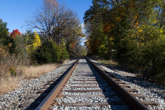 Cross over train tracks.