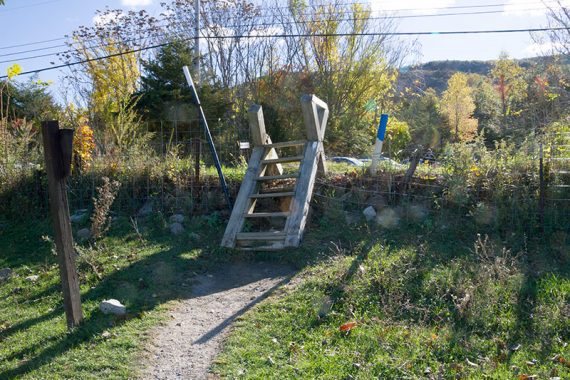 Climb a stile before crossing Rt 94