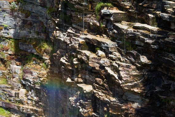 Close up of a rainbow over the falls.