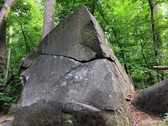 Large very angled boulder that comes to a point at the top