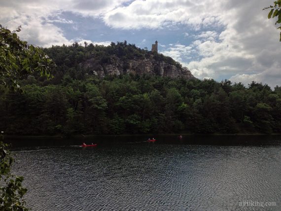 Sky Top tower seen on a cliff with a lake below.