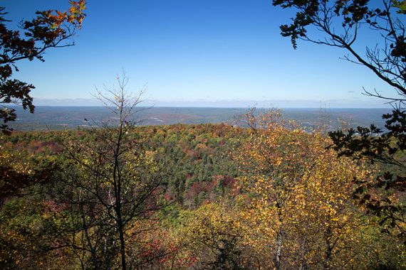 View across Pennsylvania of fall foliage covered hills .