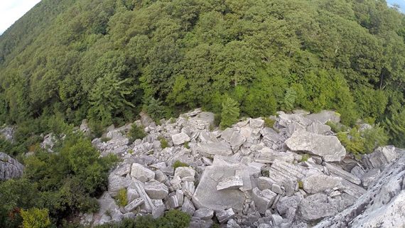 Looking down at a pile of large rocks below Bonticou Crag.