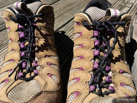 Compression laces shown on a hiking shoe.