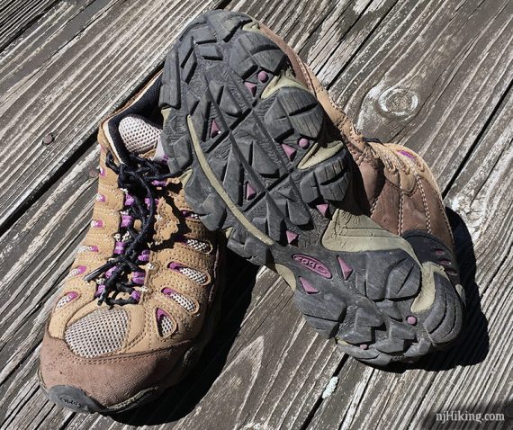 The bottom of a women's hiking shoe showing the lugs on the tread.