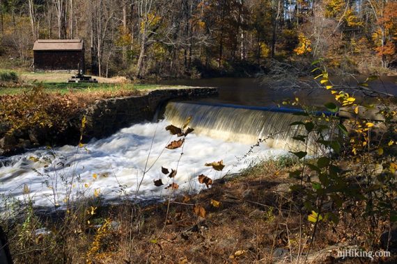 Water flowing over a spillway.