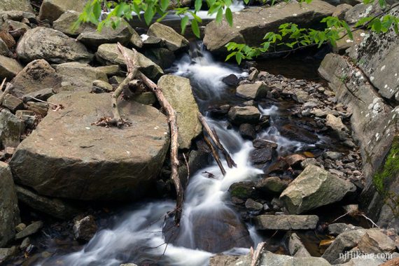 Small cascades winding through rocks in a stream.