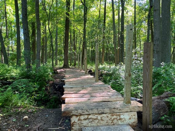 Wooden bridge under construction.