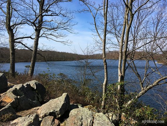 View of Sunfish Pond from with rocks in the foreground.