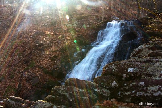 Laurel Falls, lower cascade with a sunburst over it.