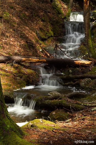 Long cascade spilling down a hill.