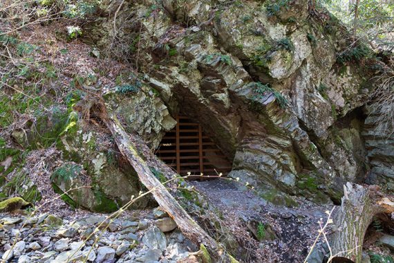 Mine opening barricaded by metal bars, 2016