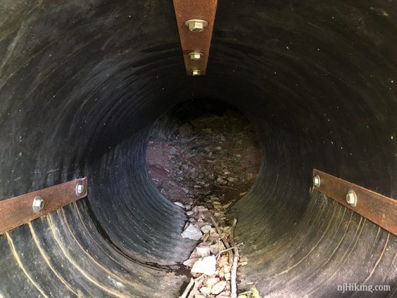 Interior of a metal tube inside a mine shaft