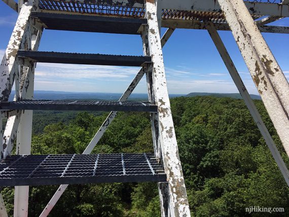 Looking through open metal steps of Catfsh fire tower 