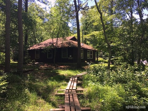 Plank boardwalk trail approaching Mohican Outdoor Center cabins