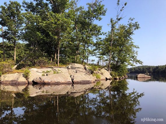 Rocky shore of an island on a reservoir.