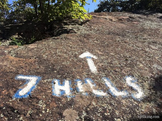 7 Hills painted on rock.