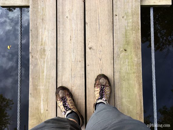 Looking down while crossing the swinging bridge