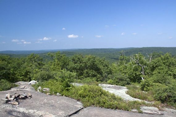 The trail follows the ridge, with views towards the west.