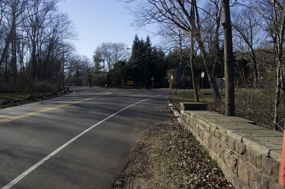 Trail jogs over a road.