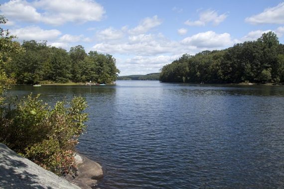 Splitrock Reservoir viewed from a small rock jutting into the water.