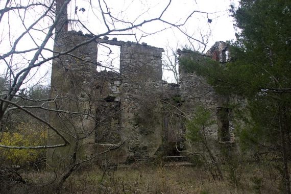 Old building foundation in the woods.