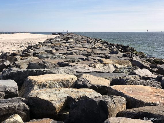 Large flat rocks against the water