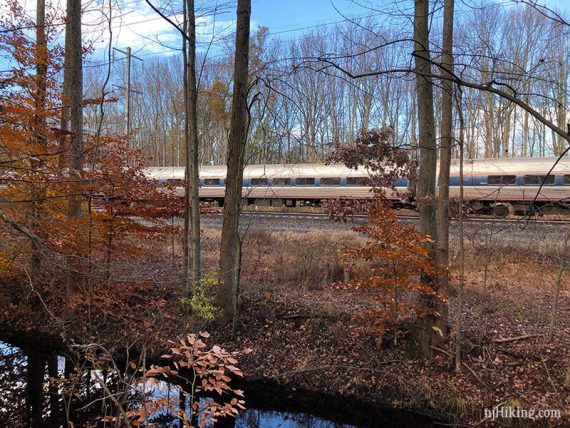 Train visible along BLUE trail.