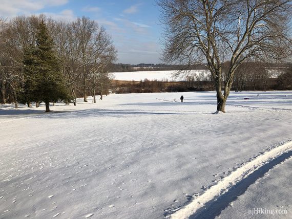 Sledding hill, head down to the left to cross on a bridge.