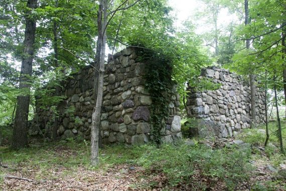 Stone ruins of an abandoned cabin