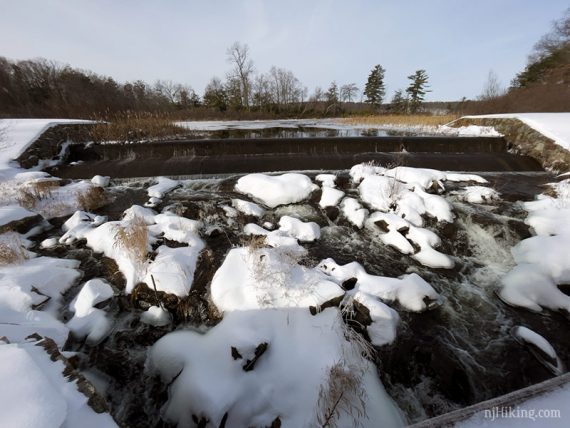 Snow and ice covered dam