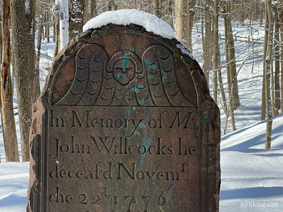 Old gravestones with snow