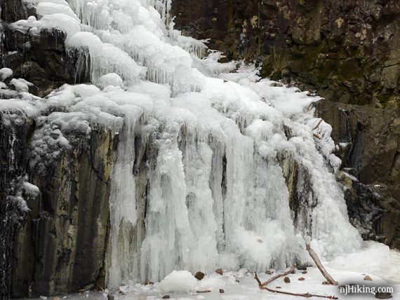 Frozen cascades at the bottom of a waterfall.