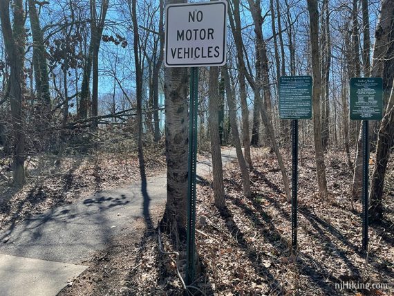 Signs at the yellow trailhead
