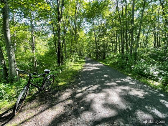 Bike next to gravel rail trail.