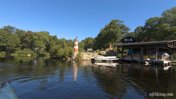 Dock and a small decorative lighthouse lakeside