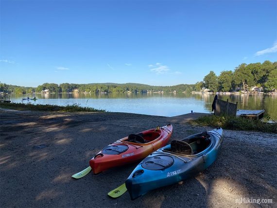 Two kayaks at a boat ramp