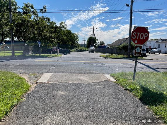 Trail sign shows a left turn onto Avenue D